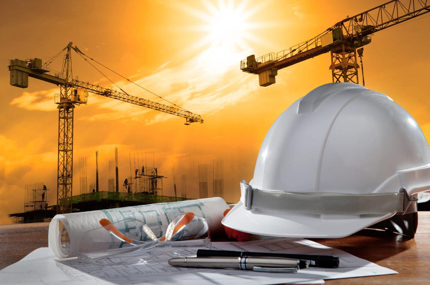 Chantier Sycomore Construction avec grues et plans